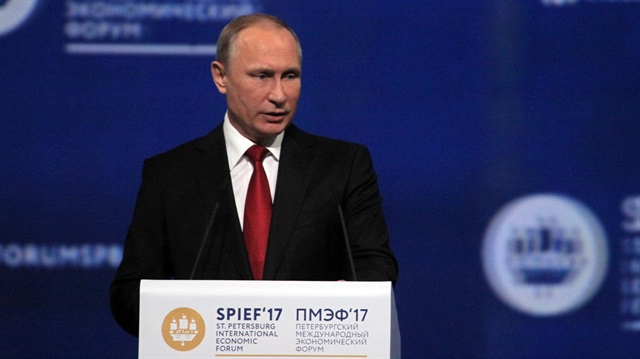 Putin denies U.S. election meddling, says he barely met Mike Flynn Putin denies U.S. election meddling, says he barely met Mike Flynn