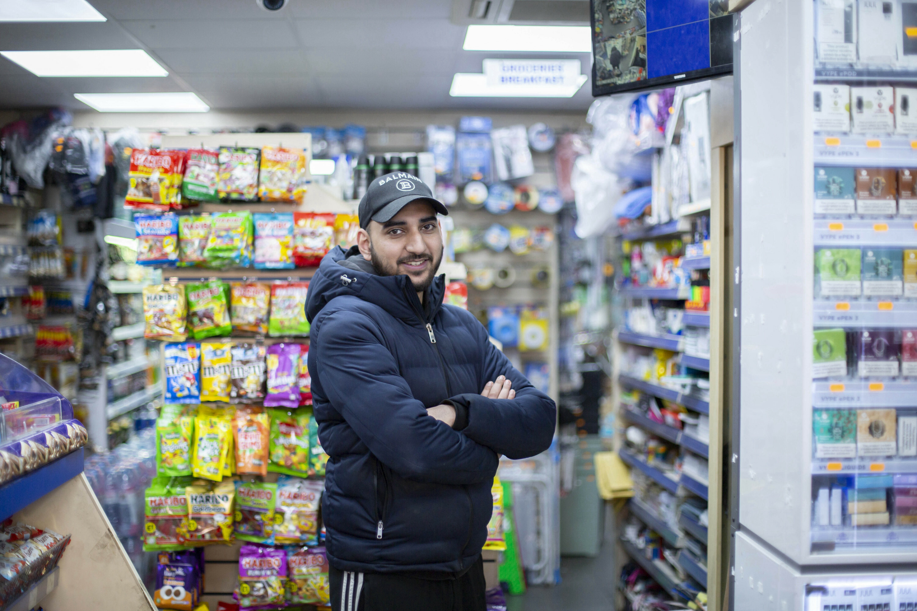Portraits of migrant shopkeepers living in London