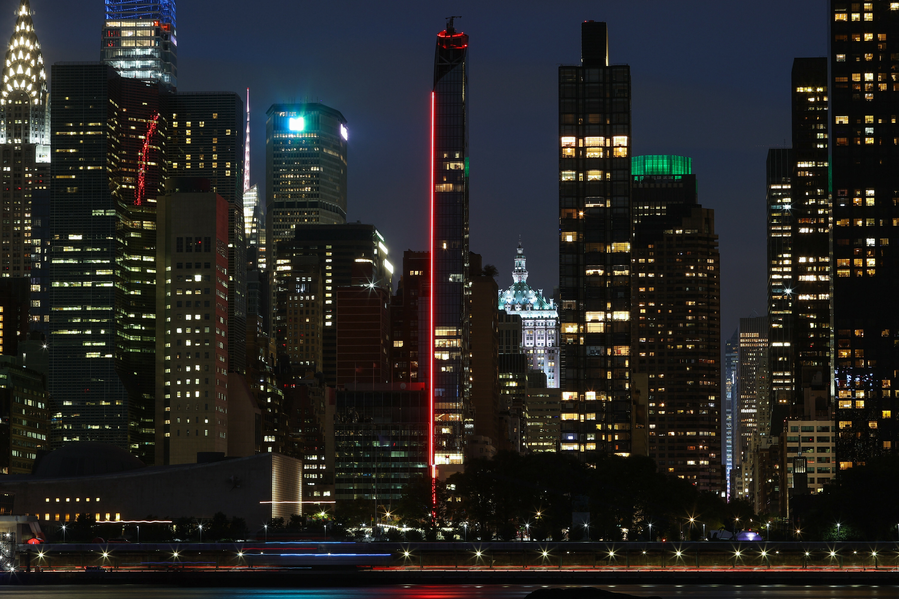 Turkish House glitters in darkness on New York City skyline