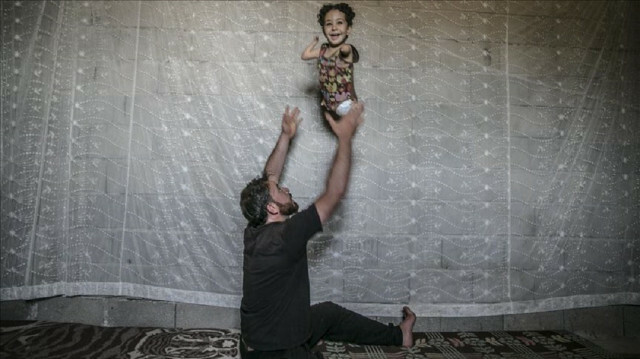 Syrians from award-winning photo win asylum in Italy