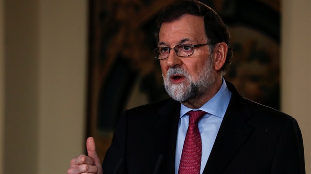 Fugitive Catalan leader asks Spain to restore his government