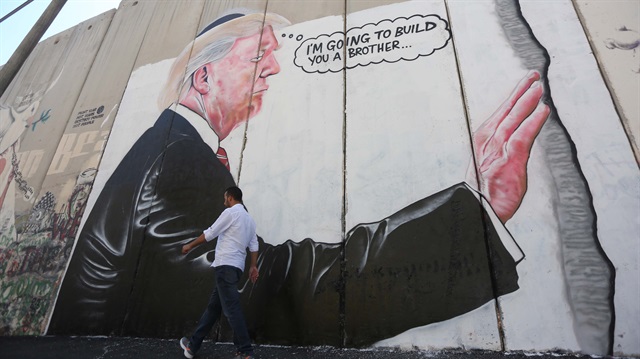 ABD Başkanı Trump'ın graffiti çalışması Filistin'deki duvarlarında