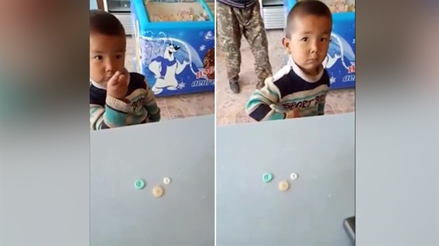 Şeker alabilmek için bakkala 3 düğme veren çocuk
