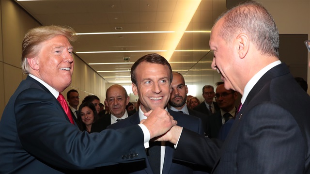 Erdoğan ile Trump'tan zirveye damga vuran kare