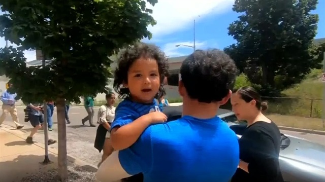 Immigrant child reunited with father after US officials separated them