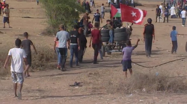 For 16th week in row, Gazans protest siege, occupation