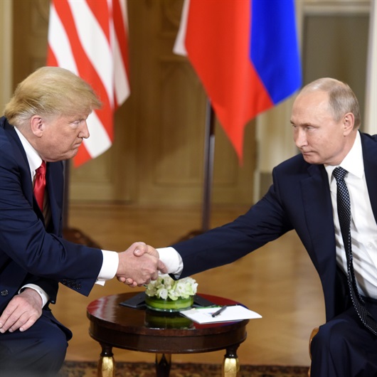 Trump ve Putin bir araya geldi