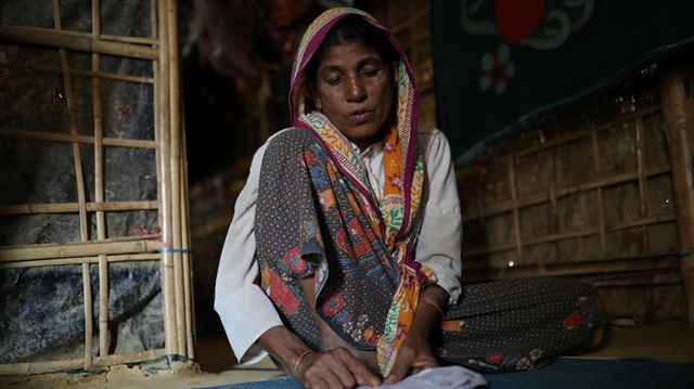 Ayesha Khatun, a Rohingya refugee, receives replies to her trace messages