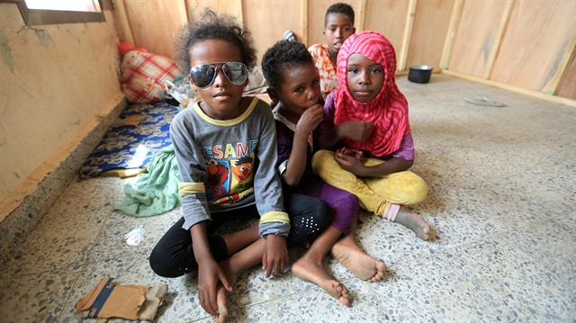 Displaced children sit in a school where they live with their family in al-Qatea near Hodeidah, Yemen.
