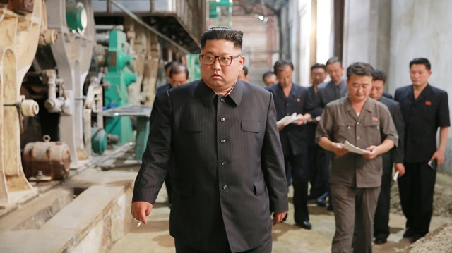 North Korea’s leader Kim Jong Un tours a factory in Sinuiju, North Korea.