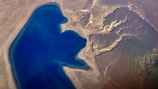 A lake and hills are seen from a plane near the city of Aktau, located near the Caspian Sea in Kazakhstan.