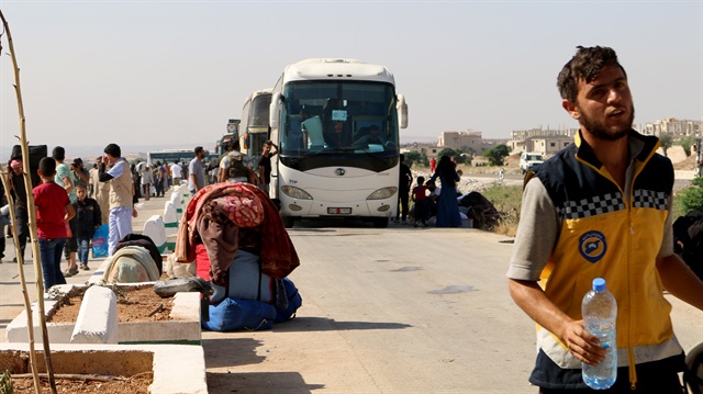 Convoy sets out from Syria’s Daraa for Idlib