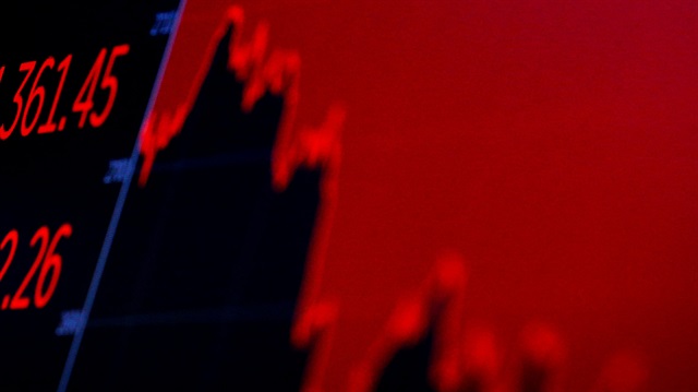 The Dow Jones Industrial average is displayed on a screen 