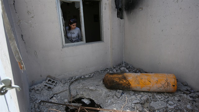 File photo: A journalist looks on during a media tour of a damaged house where Organisation for the Prohibition of Chemical Weapons (OPCW) inspectors are belived to have visited in Douma near Damascus, Syria 