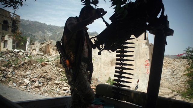 File photo: A government soldier mans a machine gun mounted on a patrol truck, at a neighbourhood the army took over, after clashes with armed militants in Taiz, Yemen 