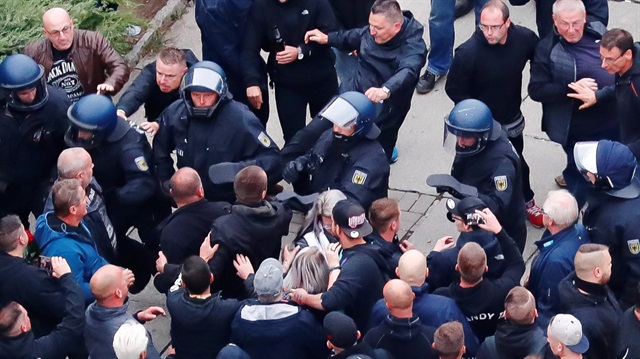 Participants of the demonstration of Germany's anti-immigration party Alternative for Germany (AfD) attack police in Chemnitz, Germany, September 1, 2018. Picture taken September 1, 2018. 