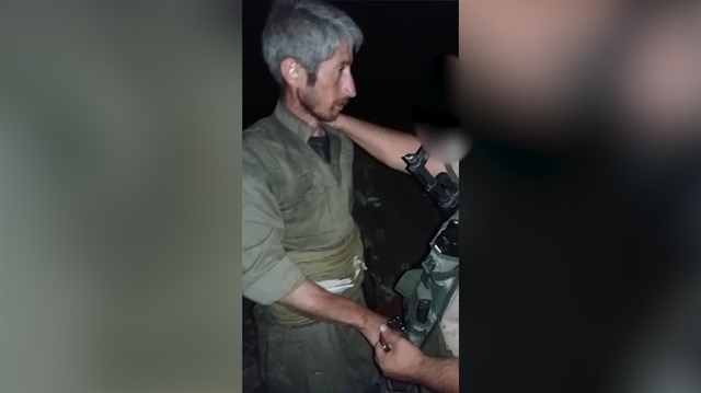PKK'lı teröristlerin teslim alındığı görüntülere Yenisafak.com ulaştı