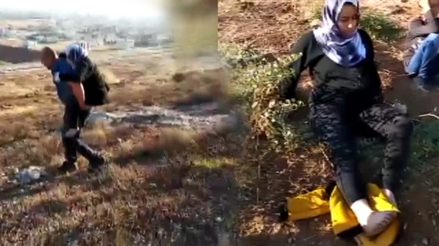 Kahraman polis yaralı kadını sırtında taşıdı