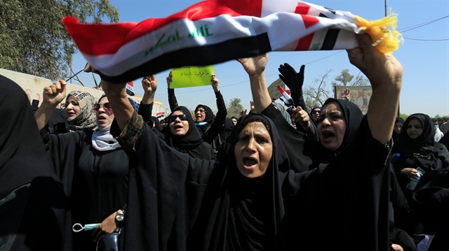 Iraqi women shout slogans during a protest in Basra, Iraq September 7, 2018. 