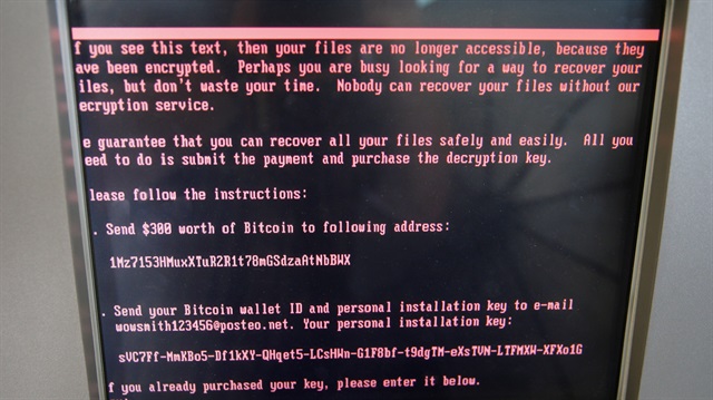 A message demanding money is seen on a monitor