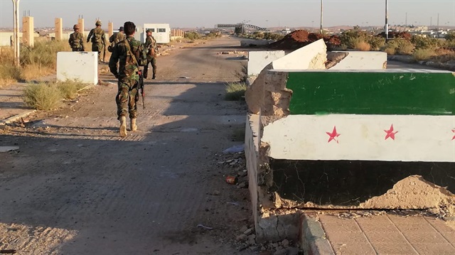 Syrian forces of President Bashar al Assad are seen in the Nassib border crossing with Jordan in Deraa, Syria July 6, 2018. 