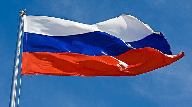 The US government charged a Russian national with playing a key financial role in a Kremlin-backed plan to conduct "information warfare" against the United States.