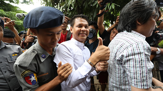 File photo: Phyo Wai Win, a reporter at Eleven Media arrives after being detained at Tamwe court in Yangon, Myanmar, October 10, 2018. 