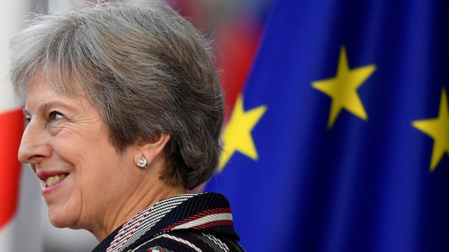 Another UK minister quits over 'travesty of Brexit'