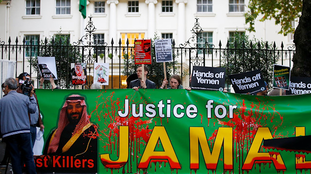 Demonstrators from the Stop The War Coalition stage the protest against the killing of Jamal Khashoggi