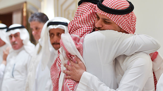Salah Khashoggi, son of Saudi journalist Jamal Khashoggi, receives a mourner offering condolences in Jeddah, Saudi Arabia November 16, 2018.