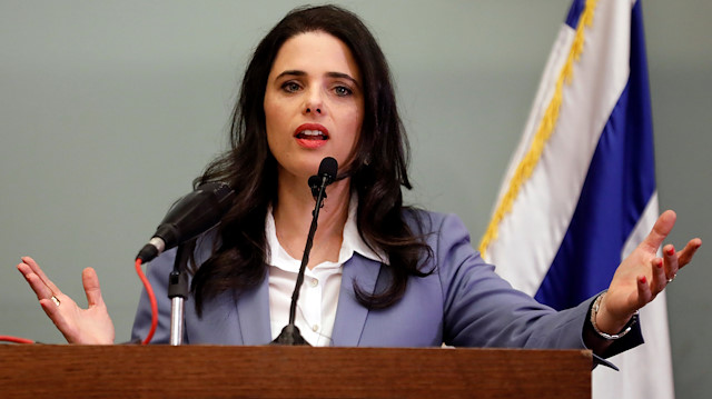 Israeli Justice Minister Ayelet Shaked delivers a statement to members of the media