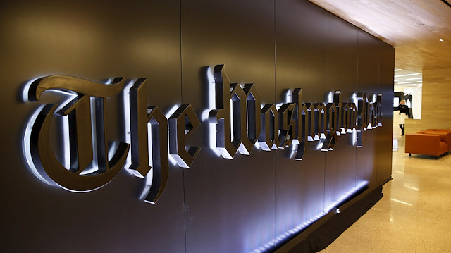 The newspaper's banner logo