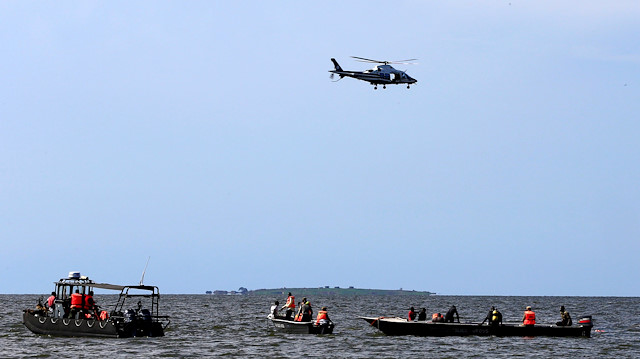 Rescue and recovery missions search for the bodies of dead passengers 