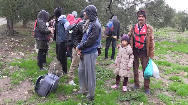 Turkish gendarmerie rescues 57 migrants from heavy rain