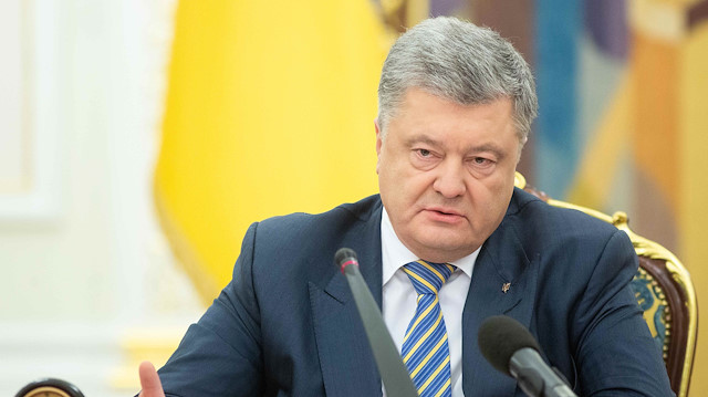 Ukrainian President Petro Poroshenko speaks during a meeting with members of the National Security Council in Kiev, Ukraine