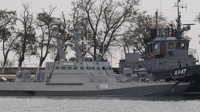 File photo: Seized Ukrainian ships, small armoured artillery ships and a tug boat, are seen anchored in a port of Kerch