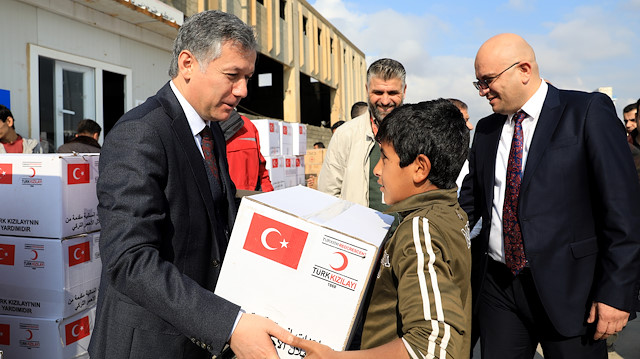 Turkey distributes winter clothes and food aid packs in northern Iraq