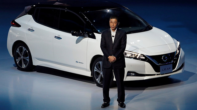 File photo: Nissan Motor Co's CEO Hiroto Saikawa speaks in front of the company's new Leaf, the latest version of the world's top selling electric vehicle (EV), during its world premiere in Chiba, Japan