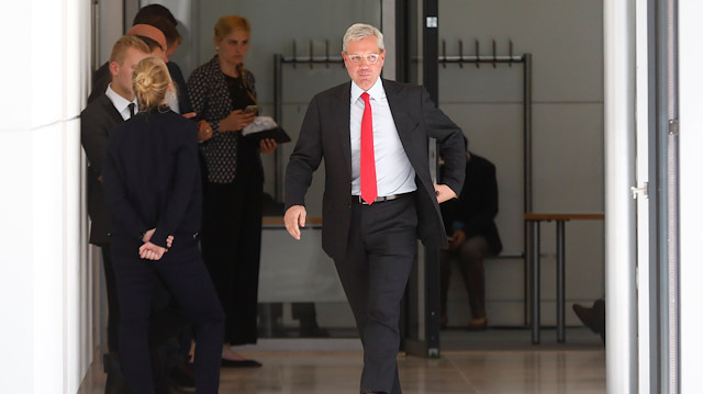 Norbert Roettgen walks at the fraction level of the German lower house of parliament Bundestag in Berlin, Germany