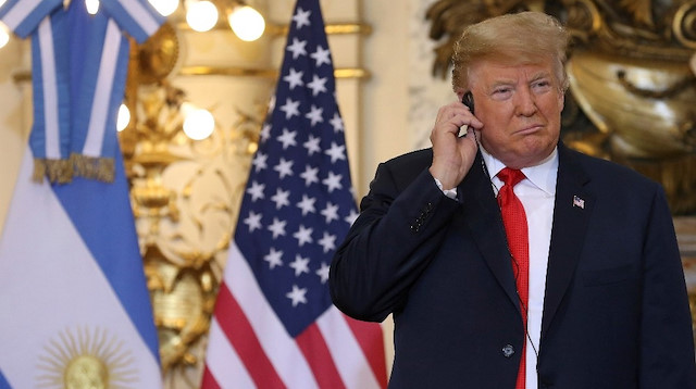 G20de çeviriyi beğenmeyen Trump, kulaklığını yere fırlattı G20de çeviriyi beğenmeyen Trump, kulaklığını yere fırlattı