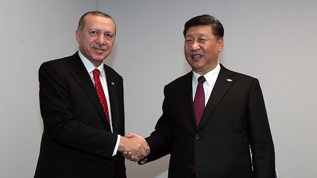 President of Turkey, Recep Tayyip Erdoğan (L) and Chinese President Xi Jinping (R) shake hands during their meeting within the G20 Leaders’ Summit in Buenos Aires, Argentina on November 30, 2018