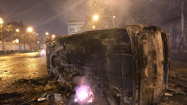 Yellow vest protest against rising fuel taxes in Paris

