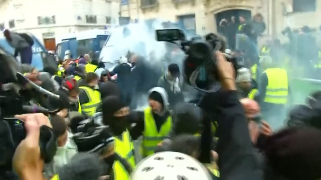 French police fire tear gas at protesters in Paris