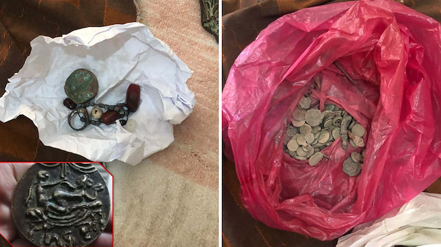 99'u bakır, 63'ü gümüş, 5'i altın 167 sikke ile kabartmalı çömlek kapağı bulundu.