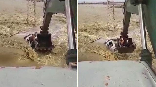 Otomobildekilerin imdadına kepçe yetişti.