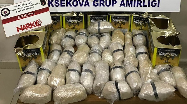 15 kilo 929 gram eroin zeytin tenekelerinin içinde ele geçirildi