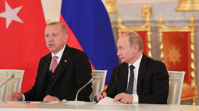 Erdoğan: Yerli ve milli paraya bir an önce geçmeliyiz
