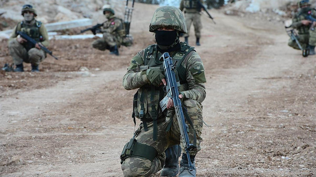 Operasyon düzenleyen askerler. Fotoğraf: Arşiv.
