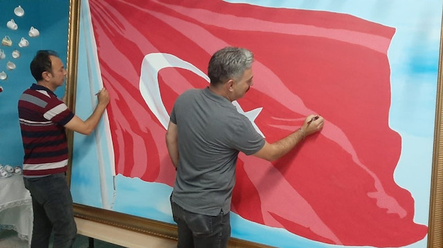 Şanlı Türk bayrağına 36 bin 647 şehidin ismini yazdılar
