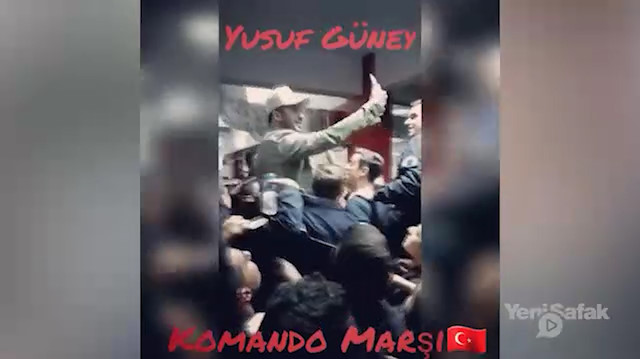 Yusuf Güney polislerle Komando Marşı söyledi